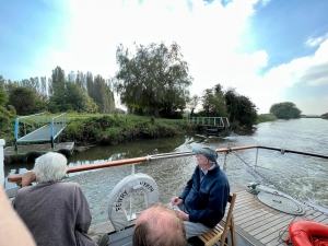Two people on boat on river