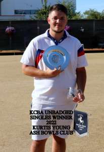 Photo of Kurtis with trophy for County Unbadged Bowls competition 2022